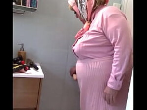 Dressed in pink from Damart the wall of the bathroom fucks me well deep with the help of my dildos the aunt I am will enjoy