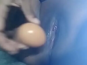 Fiji wife mastubating with an egg