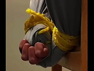 Chilean casual man&#039_s hands tied up so tightly and struggling