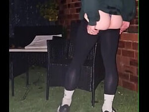 Cute boy teasing outside in leggings and panties